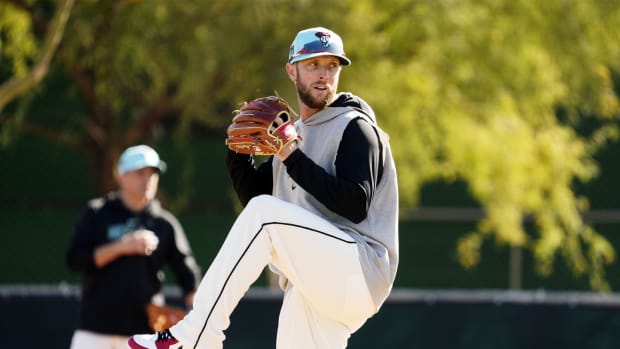 Arizona Diamondbacks right-hander Merrill Kelly participates in PFP drills at Salt River Fields.